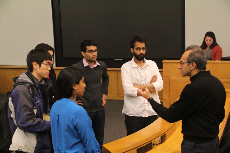 SAI Director Tarun Khanna speaks with finalists after the pithes.