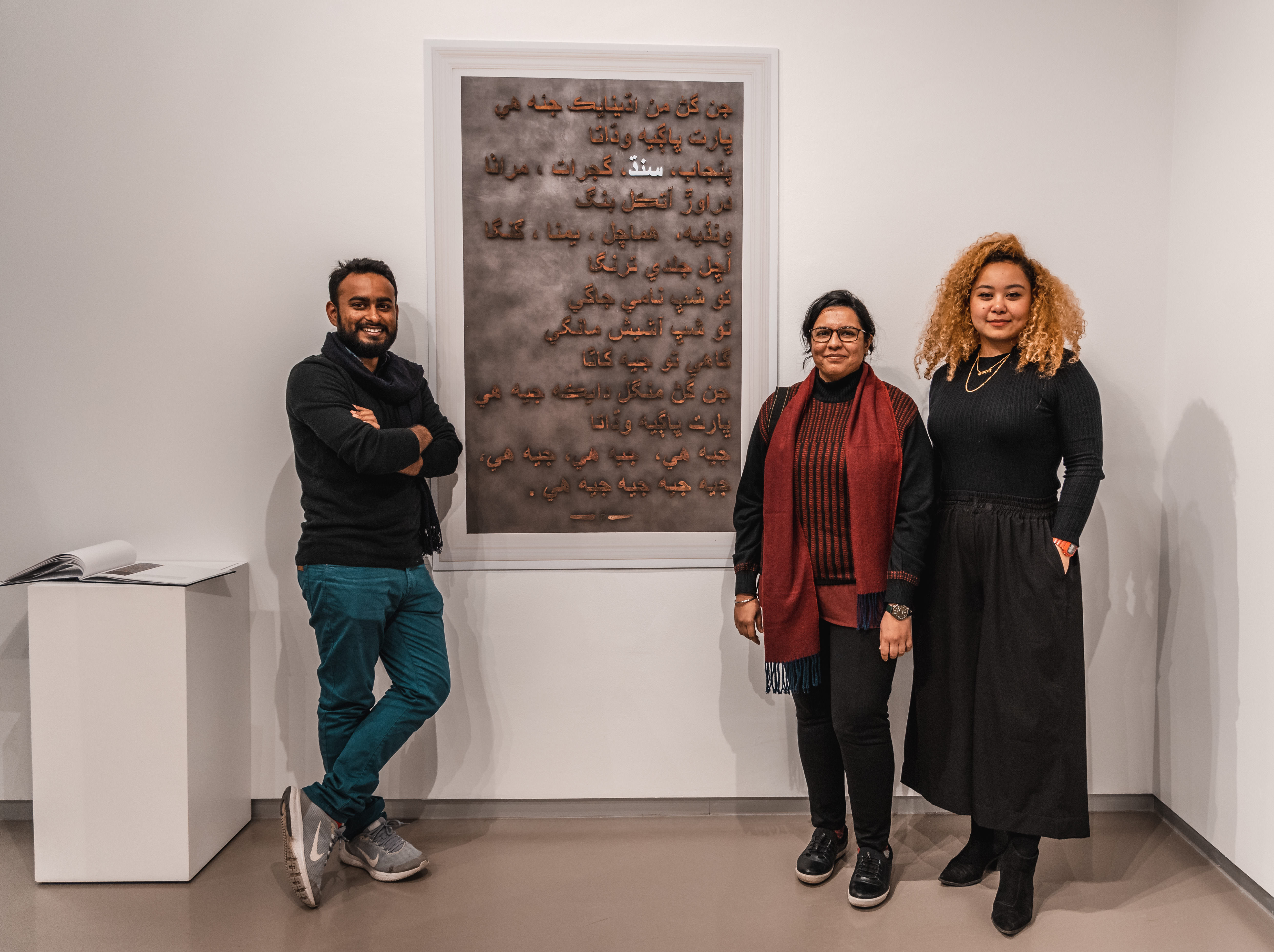 The Spring 2019 Visiting Artist Fellows at their gallery exhibition with Sneha Shrestha (right), the Mittal Institute’s Arts Program Manager.