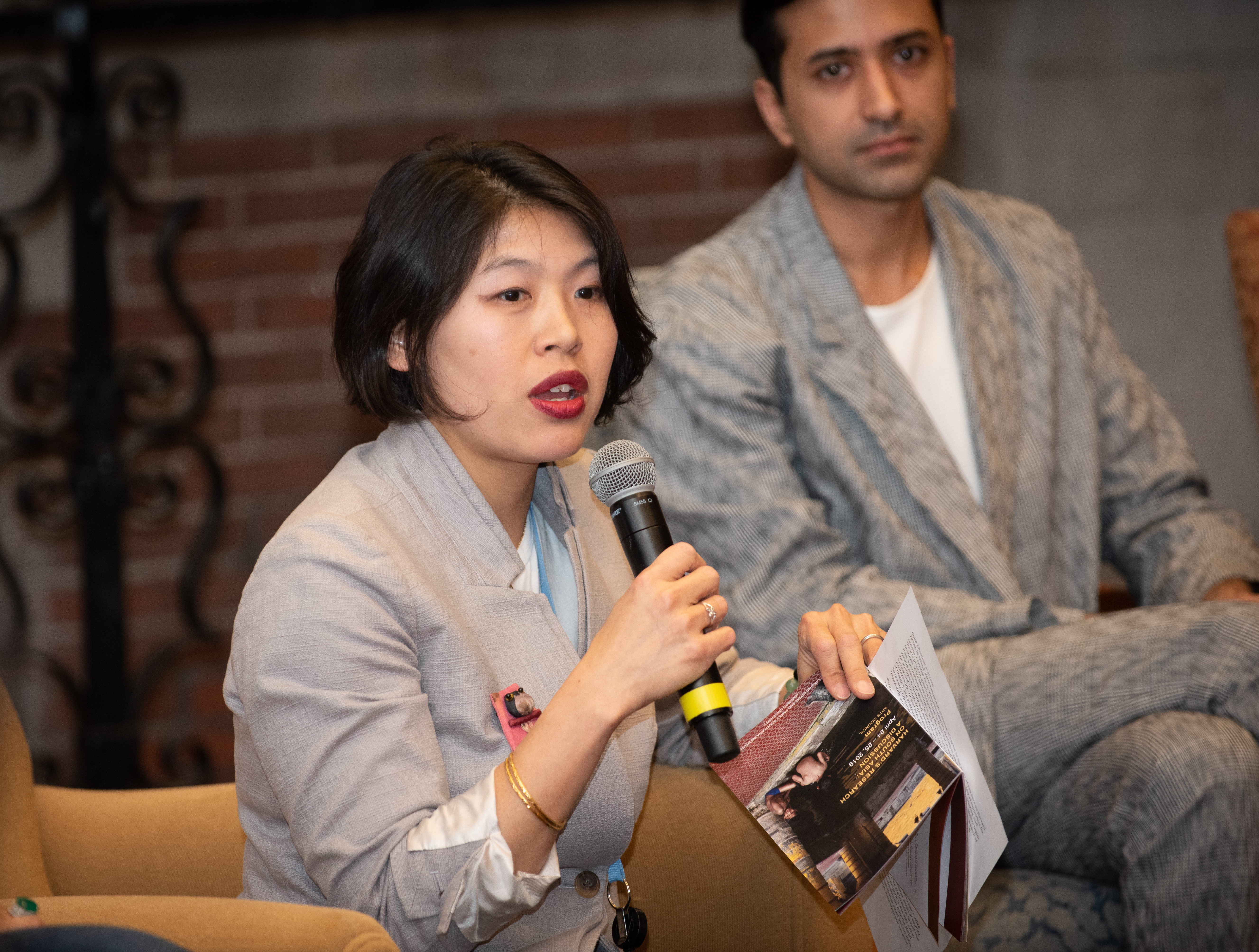 Jinah Kim and Shanay Javeri (background) speak during the Arts in South Asia session.