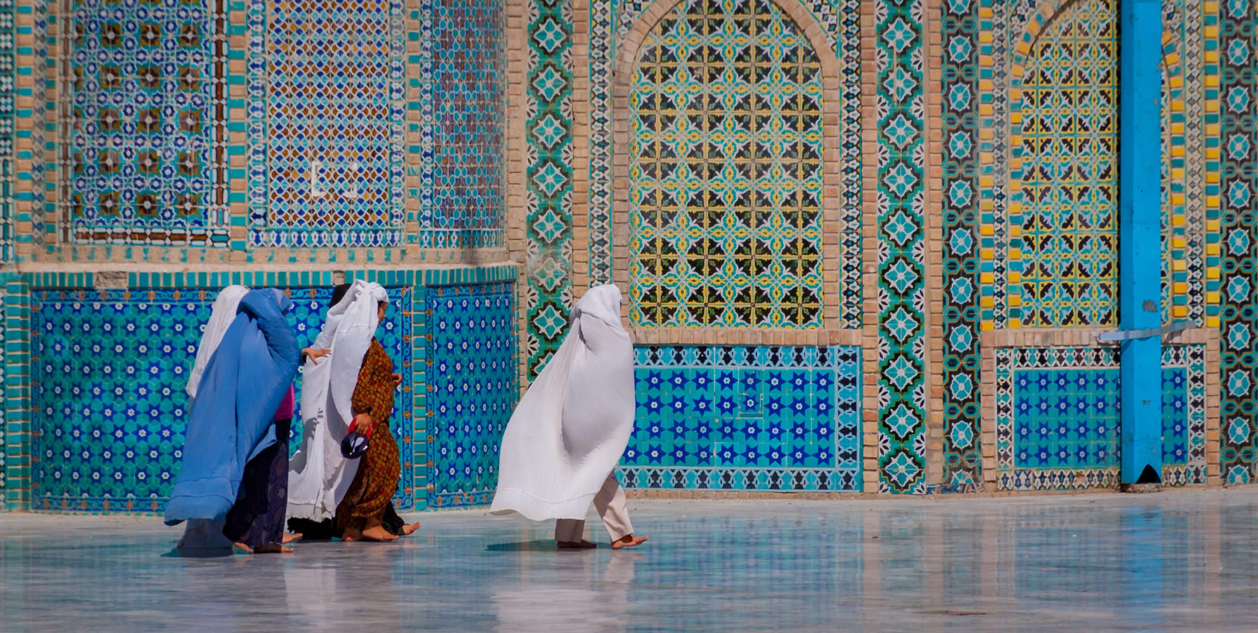 Mazar-e Sharif, Afghanistan, May 2004: Women in burqas at the Blue Mosque in Mazar-e Sharif