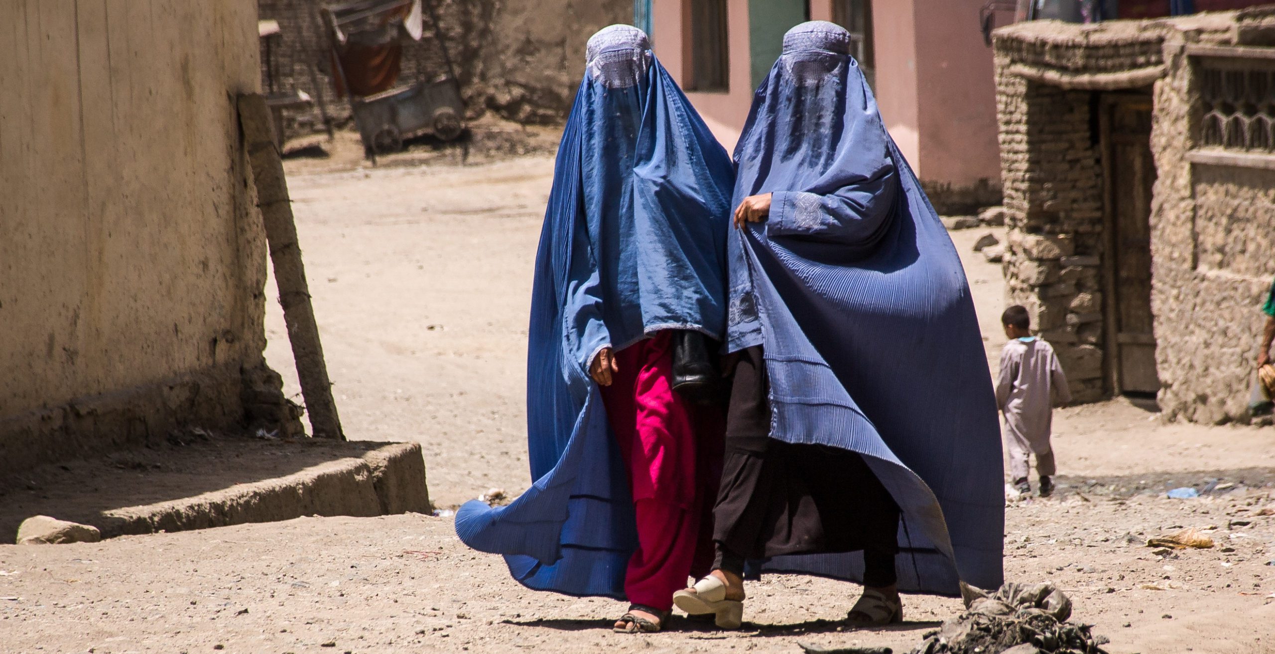 Afghan women in burqas walking in the street in Kabul